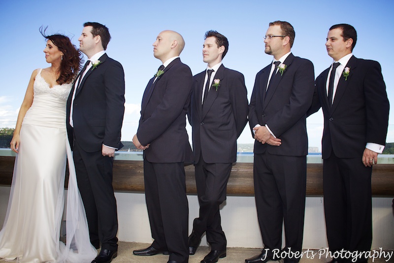 Couple and groomsmen during wedding ceremony - wedding photography sydney